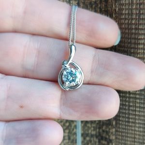 Silver and zircon pendant on silver chain